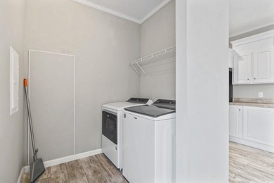 Welcome to Market Village! This welcoming 3-bedroom, 2-bath - photo 19