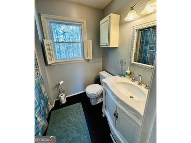 LAKE FRONT, HUGE 8 CAR GARAGE, POOL, DEEP WATER DOCK WITH LIFT - photo 19