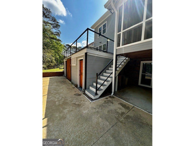 LAKE FRONT, HUGE 8 CAR GARAGE, POOL, DEEP WATER DOCK WITH LIFT - photo 24