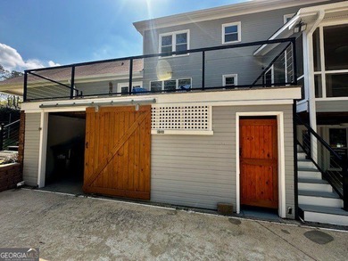 LAKE FRONT, HUGE 8 CAR GARAGE, POOL, DEEP WATER DOCK WITH LIFT - photo 25