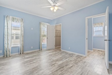 Welcome to Market Village! This welcoming 3-bedroom, 2-bath - photo 26