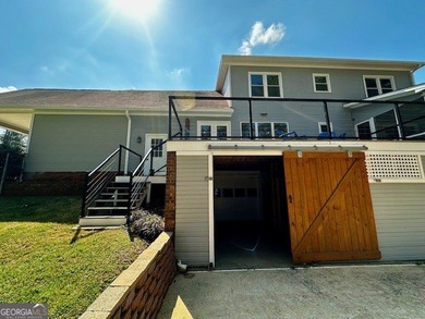LAKE FRONT, HUGE 8 CAR GARAGE, POOL, DEEP WATER DOCK WITH LIFT - photo 26