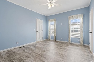 Welcome to Market Village! This welcoming 3-bedroom, 2-bath - photo 27