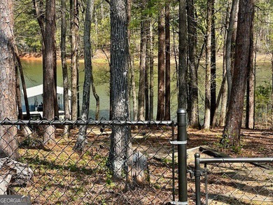 LAKE FRONT, HUGE 8 CAR GARAGE, POOL, DEEP WATER DOCK WITH LIFT - photo 29