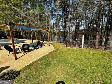 LAKE FRONT, HUGE 8 CAR GARAGE, POOL, DEEP WATER DOCK WITH LIFT - photo 30