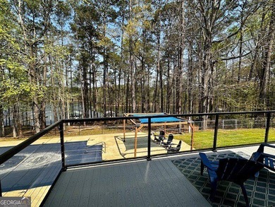 LAKE FRONT, HUGE 8 CAR GARAGE, POOL, DEEP WATER DOCK WITH LIFT - photo 34
