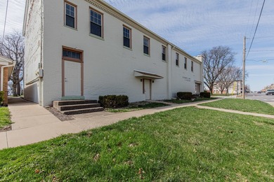 This sturdy brick building offers an incredible opportunity for - photo 3