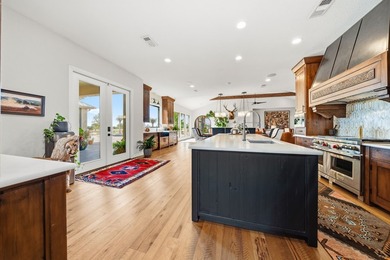 This fully remodeled 6,514 square foot estate offers an - photo 12