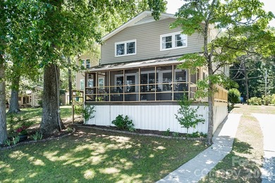 Escape to paradise in this inviting, spacious lakefront home - photo 1