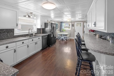 Escape to paradise in this inviting, spacious lakefront home - photo 6