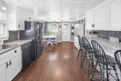 Escape to paradise in this inviting, spacious lakefront home - photo 8