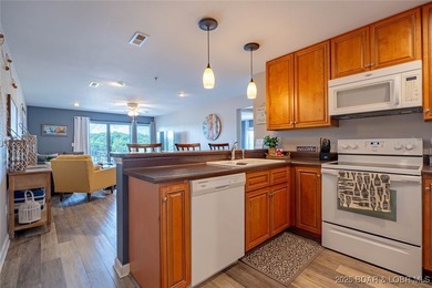 Welcome to this beautifully remodeled, walk-in end unit at The - photo 11