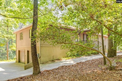 Tucked away on a serene 3.2-acre lot in sought-after Lexington - photo 4