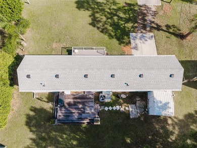 Own the land, skip the lot rent, and enjoy turnkey canal-front - photo 36