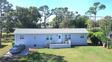 Own the land, skip the lot rent, and enjoy turnkey canal-front - photo 39