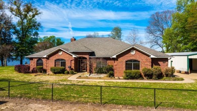 This beautiful brick home on gorgeous Lone Star Lake (Ellison - Lake Home For Sale in Lone Star, Texas
