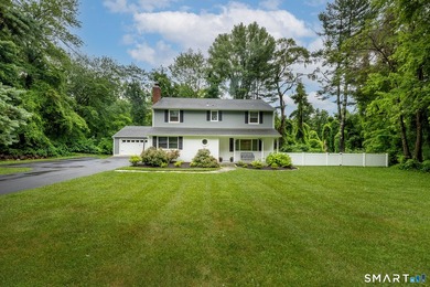Centrally located yet private, this impeccably maintained - photo 1