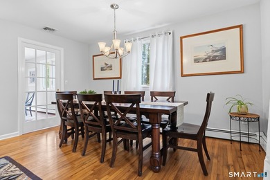 Centrally located yet private, this impeccably maintained - photo 3