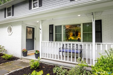 Centrally located yet private, this impeccably maintained - photo 6