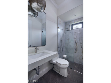 Fully renovated lakefront estate in the prestigious gated - photo 29