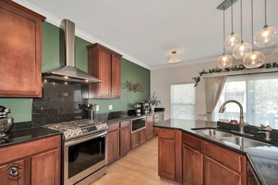 Step into three levels of light-filled living in this - photo 17