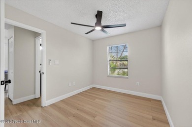 Welcome home to this charming 3-bedroom, 2-bath residence with a - photo 23
