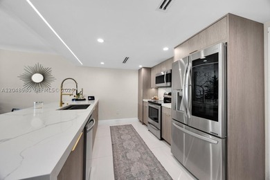 Beautifully remodeled 2-bedroom, 2-bath residence featuring a - photo 11