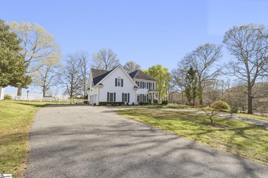 Gorgeous estate on over 8 acres featuring a pond, creek, and - photo 2
