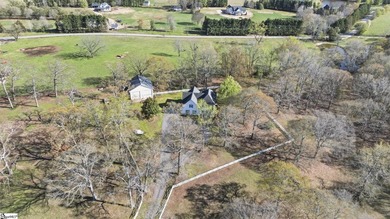 Gorgeous estate on over 8 acres featuring a pond, creek, and - photo 3