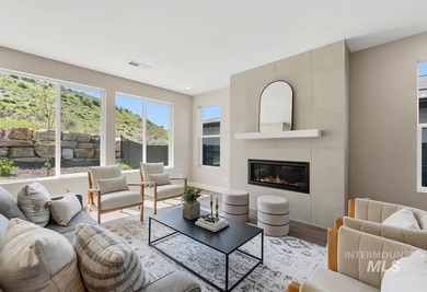 Set against the Eagle Foothills, this Shea Homes Symphony floor - photo 4