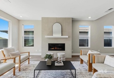 Set against the Eagle Foothills, this Shea Homes Symphony floor - photo 5