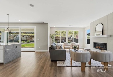 Set against the Eagle Foothills, this Shea Homes Symphony floor - photo 6