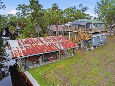 Discover the ultimate Suwannee, FL waterfront retreat with this - photo 11