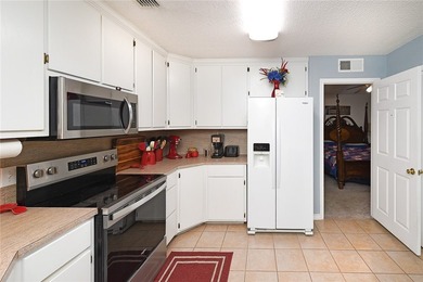 Check out the VIRTUAL WALK-THROUGH. This well-maintained - photo 12