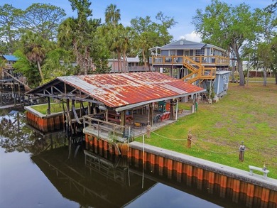 Discover the ultimate Suwannee, FL waterfront retreat with this - photo 13