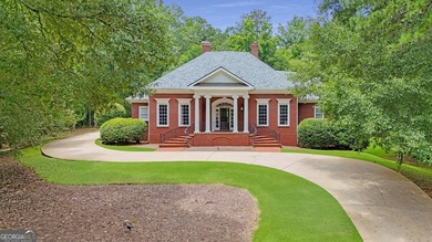 Welcome to this stunning executive 4-sided brick home on 1.11 - photo 1