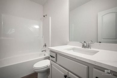 Nestled on nearly three acres of pristine land in Fairhope, this - photo 27