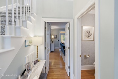 Nestled within the gated golf course community of Porters Neck - photo 5