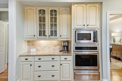 Nestled within the gated golf course community of Porters Neck - photo 8