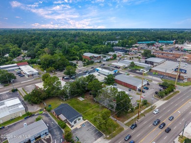 This +/-0.18-acre commercial lot, located at 1024 S. College - photo 3