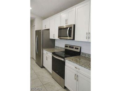 This spacious 4-bedroom, 2-bath home features a 2-car garage and - photo 12