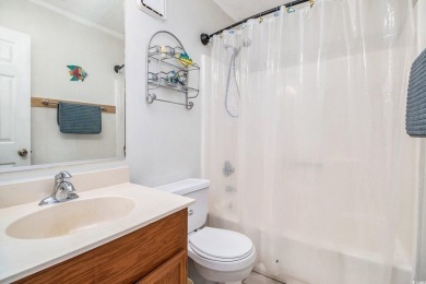 Discover your seaside retreat in this charming 3-bedroom, 2