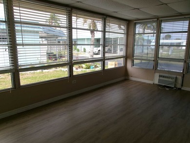 This home features 2 bedrooms, 2 bathrooms, a Florida Room for - photo 5