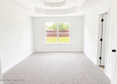 This beautifully updated 4-bedroom, 2-bath home is located in a - photo 11