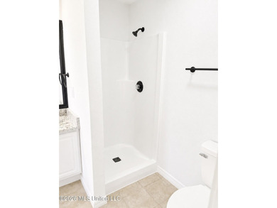 This beautifully updated 4-bedroom, 2-bath home is located in a - photo 14