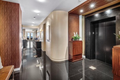 Perched atop the prestigious Excelsior Condominium, this - photo 15