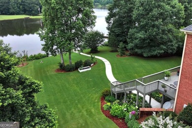 Lakefront Living at Its Finest- welcome to this stunning - photo 2