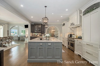 WITH OVER 400' OF PRIME SPRING LAKE WATER FRONTAGE SITS THIS - photo 33