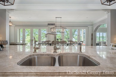 WITH OVER 400' OF PRIME SPRING LAKE WATER FRONTAGE SITS THIS - photo 35