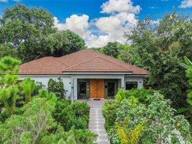 (private lake, pond, creek) Home Sale Pending in North Miami Florida